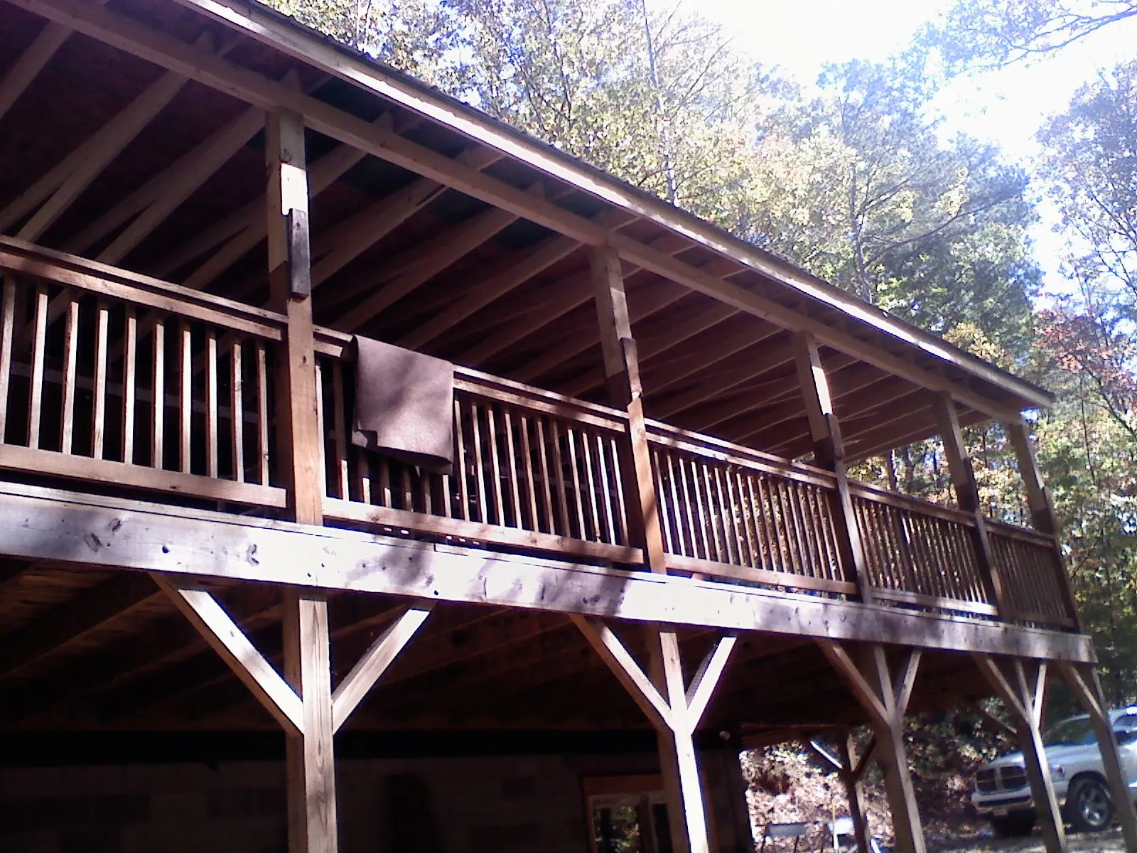 Timber framing under a new elevated porch and deck — Roof Leak Repair in Marquette by Roofing Brothers
